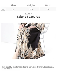 Detailed view of bohemian paisley print on a retro stand collar maxi dress fabric