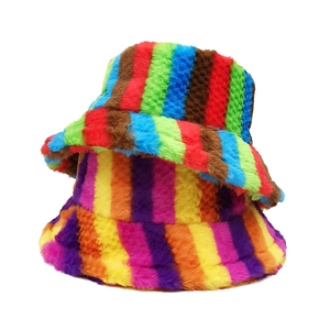 Close-up of rainbow striped faux fur plush bucket hat with thick warm texture