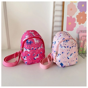 Detail of kids unicorn backpacks in rose and light pink with adjustable straps