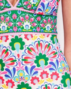 Detail of bohemian mandala print swimwear fabric with vibrant floral patterns and textures
