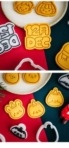 Detailed view of festive cartoon cookie cutters and stamps with animal motifs