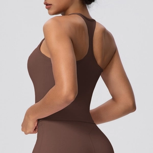 Detail shot of the racerback design and chocolate brown stretch fabric on this yoga top