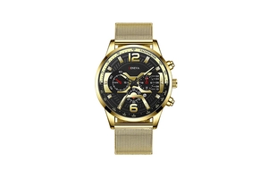 Close-up of golden mesh strap watch with black dial and luminous date display