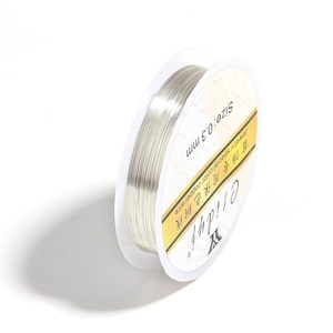 Detail view of 0.3mm silver color-preserving copper wire spool for DIY jewelry making
