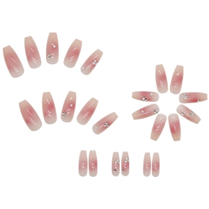 Glossy pink gradient coffin press-on nails with small silver rhinestones for manicure