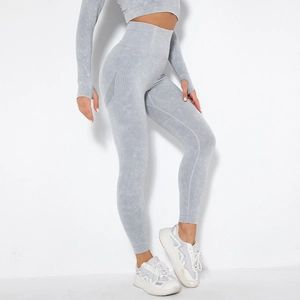 Detail view of seamless gray scrunch leggings with side ribbed texture and high waist