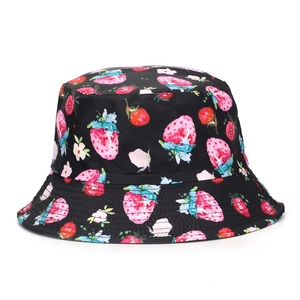 Outdoor sun protection bucket hat featuring strawberry digital print on black fabric