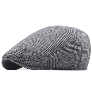 Side view of classic grey plaid ivy cap showing British retro pattern and premium texture