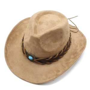 Detail of camel western cowboy hat featuring braided leather band and turquoise stone accent