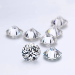 Macro detail of D-color round brilliant cut moissanite stones with vivid fire display
