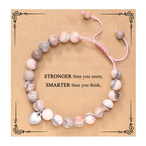 Beaded heart bracelet on a sentimental gift card for granddaughter with natural stones