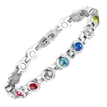 Detail of magnetic health bracelet with colorful crystals and polished steel links