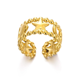 Macro detail of 18K gold stainless steel starfish ring with adjustable beaded open band