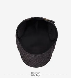 Detail of warm plush lining and foldable ear flaps on men's winter flat cap