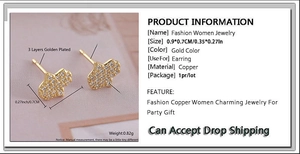 Detailed view of gold Hamsa Hand earrings with cubic zirconia, size 0.9 by 0.7 cm