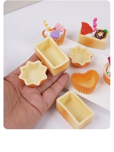 Macro shot of realistic golden tart crust models for DIY cream glue craft miniatures