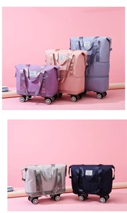 Detail showing foldable travel bags with wheels in various colors and nylon material