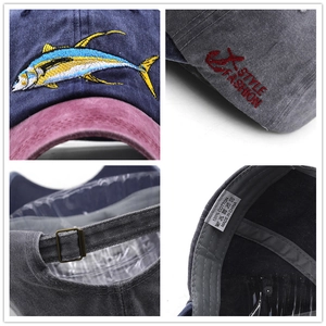 Navy and burgundy washed cotton fishing baseball cap with detailed fish embroidery