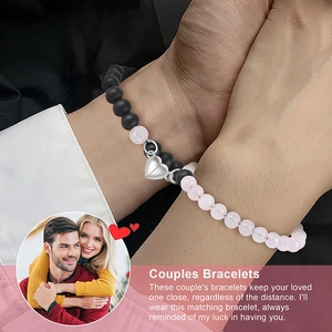 Pink quartz and matte black beaded magnetic couple bracelets with a heart attraction charm