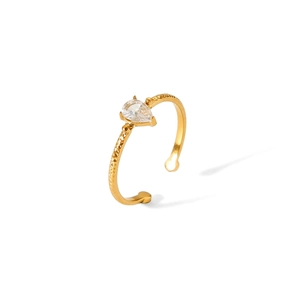 Detail view of 18k gold plated ring with teardrop zircon and textured hammered finish