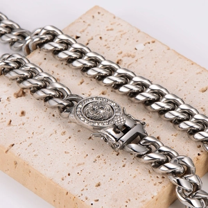 Silver stainless steel cuban link necklace with iced out lion head buckle on stone