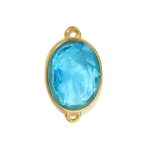 Close-up of light blue oval gemstone charm with gold plated double loop connector