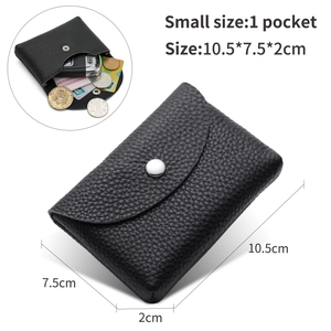 Detail view of small black leather coin purse showing interior capacity and dimensions