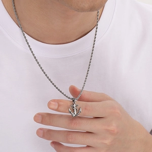 Retro stainless steel anchor pendant necklace with silver twisted chain on male model