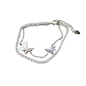 Double-layered butterfly charm bracelet featuring purple crystals and silver finish