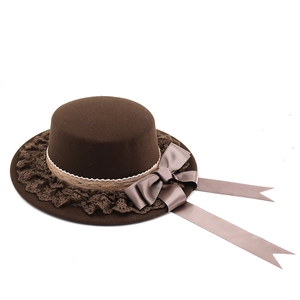 Dark brown wool felt cloche hat with lace trim and large satin bow decoration