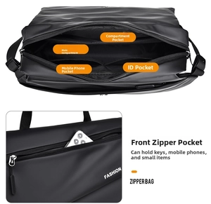 Detail view of the black functional crossbody bag with internal compartments and front pocket