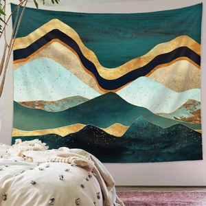 Detail view of abstract gold mountain tapestry hanging as modern bedroom wall art decor