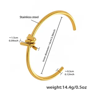 Technical drawing showing measurements of a gold stainless steel knot cuff bracelet
