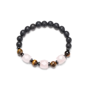 Macro detail of natural tiger eye, lava rock and faceted pink crystal beaded bracelet
