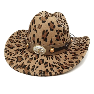 Western cow print cowboy hat with vintage turquoise bull buckle and leather band
