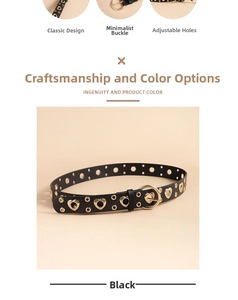 Detailed close-up of punk style black belt with golden heart hollow studs and metal buckle