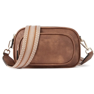 Retro brown crossbody bag with wide geometric strap, stylish shoulder bag for daily use.