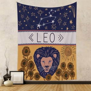 Detail of Leo zodiac tapestry featuring golden lion motifs and sunflowers on fabric