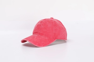 Close-up of vintage washed pink cotton baseball cap with detailed stitching and six-panel crown