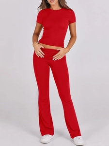 Detail of red two-piece set featuring short sleeve T-shirt and high waist flare pants