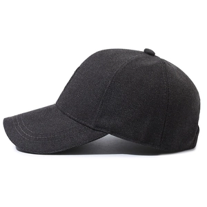 Classic black men's baseball cap with textured woven fabric and structured six-panel design