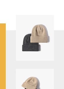 Close-up of ribbed texture on beige and charcoal grey knit beanies for autumn winter