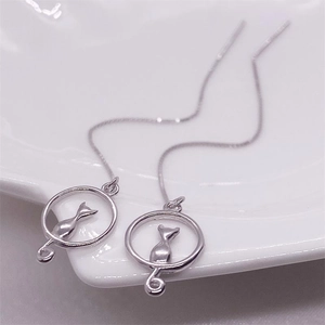 Elegant S925 sterling silver moon cat drop earrings with minimalist silhouette on ceramic