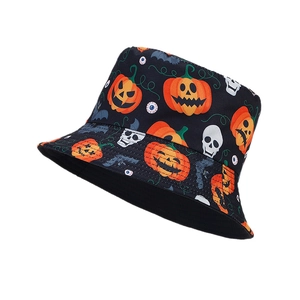 Reversible bucket hat with orange pumpkin and white skull prints for Halloween party