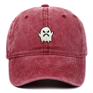 Detail of ghost embroidery on vintage washed denim baseball cap in burgundy red