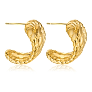 Detail view of gold C-shaped twisted rope earrings with high-polish metallic finish