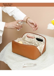 Detailed interior view of mocha brown PU leather makeup bag with storage compartments