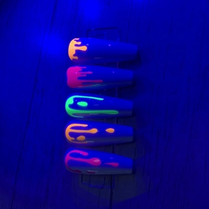 Luminous fish scale moon and star nail art stickers with neon drip effect in dark