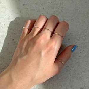 Minimalist S925 sterling silver ultra-thin rings set on hand with high polish finish