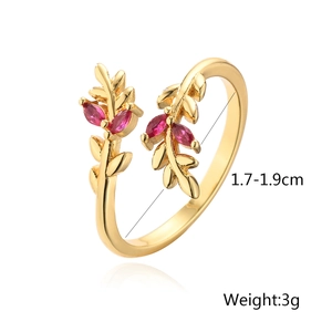 Detail of leaf-shaped gold ring with red marquise stones and sizing specifications